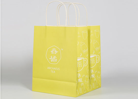 O papel torcido segura sacos de compras feitos sob encomenda para a embalagem do presente e da roupa