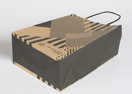Os sacos de compras reusáveis de Kraft, formam sacos de papel listrados com punhos