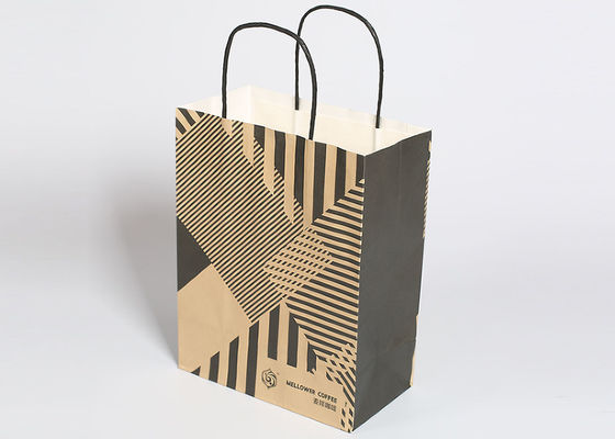 Os sacos de compras reusáveis de Kraft, formam sacos de papel listrados com punhos